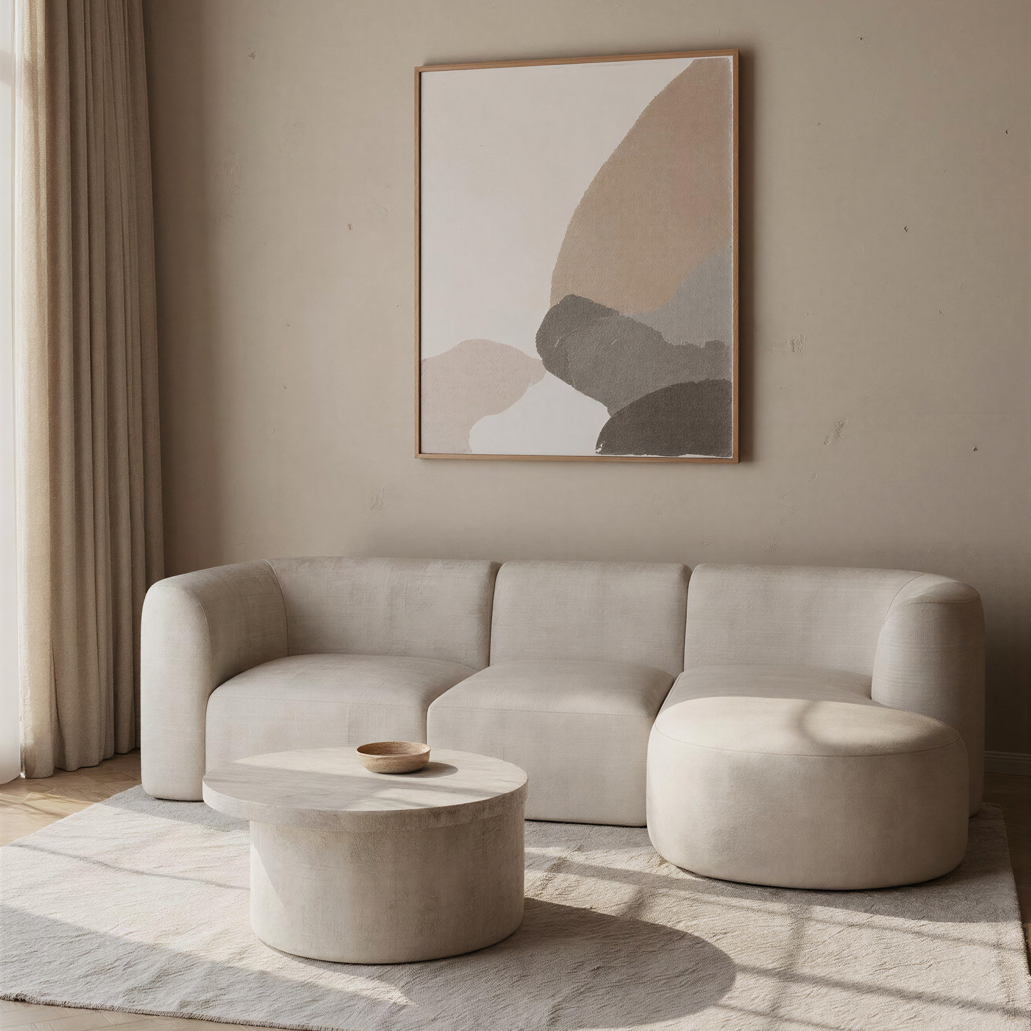 Modern arched floor lamp with layered white shade beside a curved cream sofa and round stone coffee table in a softly lit minimalist living space.